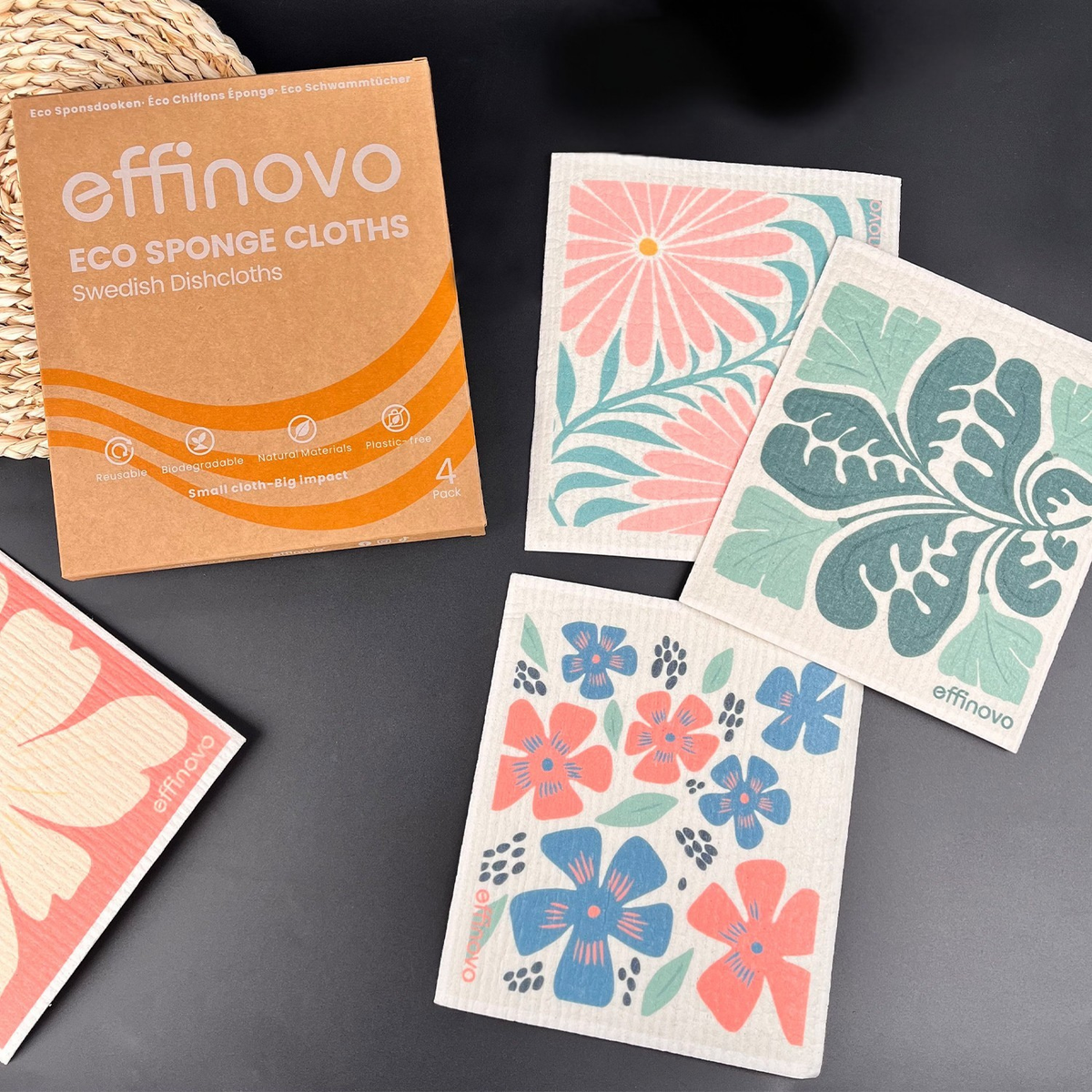 Eco-friendly Swedish dishcloths with colorful floral designs and cardboard packaging